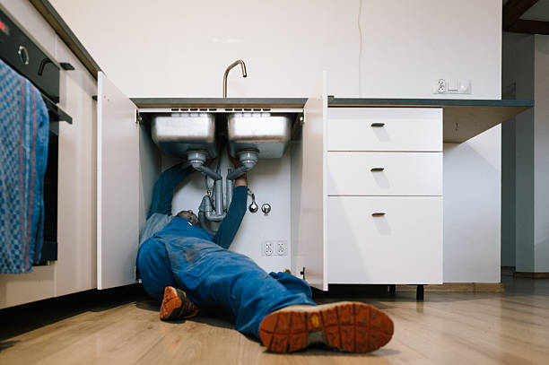 Professional Drain Cleaning technician working in Malta, OH